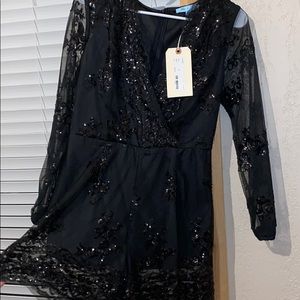 Black sparkly romper with long sleeves